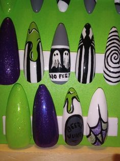 "\"Recently Deceased\" full set of press on nails. Includes 14 nails in 7 sizes. These fun, Beetlejuice-inspired nails are done in gray, white, purple and \"slime\" green. They feature hand-painted sandworms, gravestones, Polaroids and spiderwebs, along with the iconic suit and swirls. Please see our sizing chart to ensure a perfect fit! Can be recreated in your custom sizes, shape and length. Includes nail glue, file, cuticle stick, alcohol wipes and an instruction sheet." Beetlejuice Nail Ideas, Beatle Juice, Funky Nail Designs, Beetle Juice