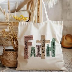 a tote bag with the word faith printed on it