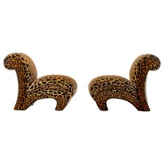 pair of animal print stools on white background