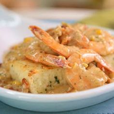 shrimp and grits in a creamy sauce on a plate