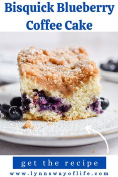 a blueberry coffee cake on a plate with a bite taken out of it and the words, bisquick blueberry coffee cake get the recipe