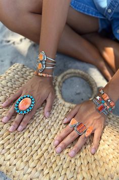 This Red Spiny Shell Cuff features a single rectangular cabochon set in a smooth oxidized bezel. The cuff is constructed with four sterling silver twists for a one-of-a-kind design. This is a stunning example of modern Navajo jewelry. Spiny Shell is found deep in the Sea of Cortez in the Baja region of the Gulf of California. The color of the shell depends on the depth of the water with the darkest colors in the deepest water. Hallmarked "NZ" Stamped "STERLING" Measurements: 5 1/4" x 1 1/4" (Ope Vintage Navajo Jewelry Stone, Southwestern Style Adjustable Rectangular Jewelry, Adjustable Orange Cabochon Jewelry, Bohemian Hand Wrapped Rectangular Jewelry, Hand Wrapped Rectangular Bohemian Jewelry, Bohemian Jewelry With Rectangular Gemstone, Orange Bohemian Jewelry With Cabochon, Bohemian Rectangular Gemstone Jewelry, Bohemian Orange Cabochon Jewelry