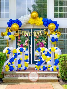 an entrance decorated with balloons and streamers