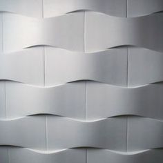 a white wall with wavy lines on it