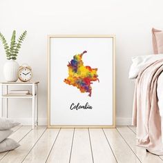 a watercolor map of the state of california is displayed in a bedroom with white walls