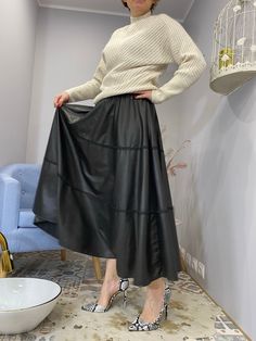 Eco leather maxi skirt. It fits any styling, is very comfortable to wear. Classic, flared cut on the belt, decorated with a ribbon. M/L size. Rubber waist 72 cm extends to 82 cm. Length 87 cm. There is a possibility of an individual order. I invite you to buy 🙂 Leather Lined Skirt For Winter, Winter Leather Midi Skirt, Leather Long Skirt For Fall, Chic Long Leather Skirt, Spring Leather Long Skirt, Leather Flared Skirt For Fall, Fall Leather Flared Skirt, Black Leather Long Skirt, Leather Pleated Skirt