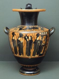 an old vase with people painted on it