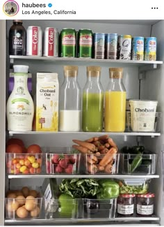 an open refrigerator filled with lots of food and condiments on it's shelves