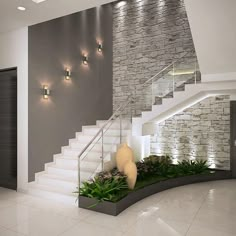 a modern house with stairs and plants in the entryway, along with lights on either side of the staircase