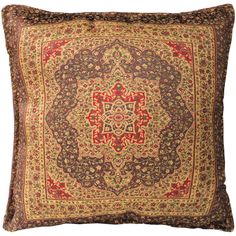 a brown and red pillow with an intricate design on the front, sitting on a white background