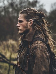 Discover 30 Bold Viking Hairstyles for Men: From Braided Classics to Modern Undercut Inspirations Viking Man Bun, Long Dark Haired Men, Modern Viking Fashion Men, Viking Men Aesthetic, Rugged Style For Men, Mens Viking Hairstyles, Modern Viking Men, Viking Hair Men, Vikings Hairstyles