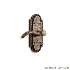 an image of a door handle with a bird on it's back and the words dummy set - left hand