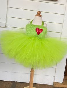 GRINCH, grinch inspired costume, grinch tutu, grinch tutu dress, grinch halloween, grinch dress Pease leave the event date in the notes to seller and or message us to make sure your tutu arrives on time. Our GRINCH tutu dress is one of our newest designs. Perfect for any event, this tutu dress is made on a fully lined crochet top. The dress was inspired by the new remake with over 100 yards of tulle. This tutu uses custom measurements. Please send us the child's measurements: under the arm to fl Grinch Dress Womens Plus, Grinch Infant Costume, Grinch Dress Kids, Dress For Grinchmas Woman, Grinch Dress, Sanderson Sisters Costumes, Grinch Halloween, Hocus Pocus Costume, Feather Tutu