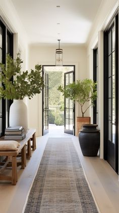 the hallway is clean and ready for us to use as an entrance way in this home