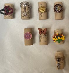 there are many different things on the table together, including wine corks and buttons