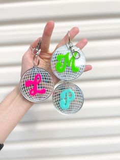 "GROOVY DISCO KEYCHAINS - ⭐️ Perfect for Party Favors - Kids Birthday, Teen Party, or Bachelorette Favors! ⭐️ Disco Ball is Silver MIRROR Acrylic + pick your own custom initial acrylic color! ⭐️ Purchasing 10+? We offer Bulk Discounts! Message us! ❤️ ⭐️ Keychain measures approx. 2.5\" and include silver keychain + lobster claw as pictured~" Disco Party Favors For Kids, Birthday Party Favors For Teens, Disco Party Favors, Disco Ball Keychain, Initial Acrylic, Bachelorette Disco, Birthday Teen, Mitzvah Themes, Groovy Birthday