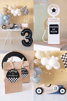 a table topped with balloons and paper bags filled with confetti, black and white decorations