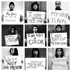 people holding signs that say i am not a color girl, my hair is actually see you