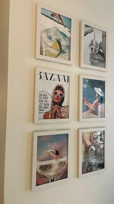 a wall with four pictures hanging on it