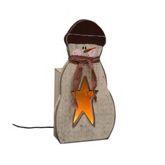 a wooden snowman with a hat and scarf holding a star