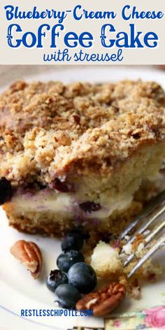 blueberry cream cheese coffee cake with crumbs and pecans on a plate