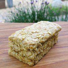 a stack of oatmeal bars sitting on top of a wooden table