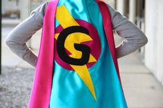 Our best selling Kids SUPERHERO Cape Personalized double sided cape - Any Initial - Girl or Boy Birt Super Hero Capes For Kids, Purple Cape, Superhero Cape, Pink Cape, Green Gloves, Blue Cape, Capes For Kids, Girls Personalized Gifts, Pink Gloves