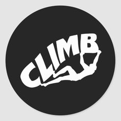 the climb logo on a black and white round sticker