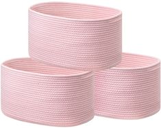 three pink round baskets sitting on top of each other