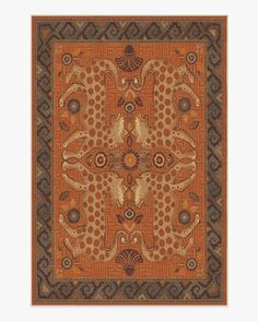 an orange and brown area rug with animals on the center, surrounded by ornate designs