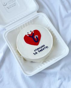 a cake in a foam container with a stethoscope on it