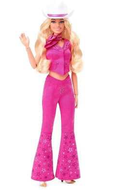 the barbie doll is dressed in pink and has a cowboy hat on it's head