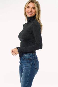 Long sleeve turtleneck crop top Model is wearing a size small Turtleneck Crop Top, Stretch Turtleneck Crop Top, Black Turtle Neck Crop Top, Stretch Ribbed Turtleneck Crop Top, Turtle Neck Style, Warm Winter Dresses, Solid Non-stretch Turtleneck Top, Turtle Neck Crop Top, Crop Top Casual