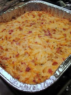 a casserole dish sitting on top of a stove