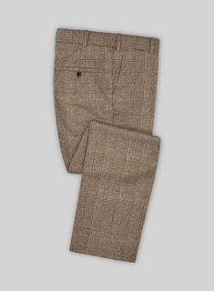 Dress up the subtly hallmarks of elegance by adding our Loro Piana Caralo Alpaca Wool Pants. However, crafted from a prosperous blend of alpaca and wool fabrics that offers a soft, comfy, bringing snug feeling with a checks pattern over brown hues. Finally, Complementing the exquisite touches of luxury with accurately tailored pants that flaunt the sharp cuts leads to a versatile option that grants a contoured silhouette to make stellar investments for various occasions.  Choice of the Elite, Lo Checks Pattern, Tailored Suit, Loro Piana, Wool Suit, Wool Pants, Tailored Pants, Alpaca Wool, Wool Fabric, Check Pattern