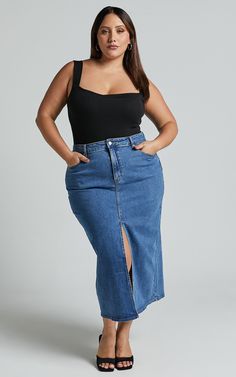 Trendy Stretch Blue Denim Skirt, Trendy Dark Wash Skirt, Trendy Stretch Denim Skirt, Trendy Stretch Dark Wash Skirt, Trendy Stretch Denim Blue Skirt, Trendy Stretch Denim Blue Denim Skirt, Trendy Stretch Denim Skirt In Denim Blue, Trendy Denim Blue Midi Skirt, Chic Blue Stretch Denim Skirt