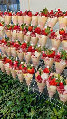 there are many cones with strawberries on them