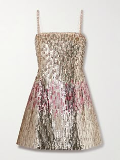 Valentino Garavani's dress is covered with sequins that give it a liquid-like shine and will reflect light from all angles - look closely and you can see they're interspersed with crystals and beads, too. Suspended from slender straps, it's been made in Italy from wool and silk-blend crepe that nips in at the waist before kicking out to an A-line skirt. Valentino Dress, Floral Dresses Short, Mini Robes, Embellished Dress, Gold Dress, Dream Dress, A Line Skirt, Net A Porter, Valentino Garavani