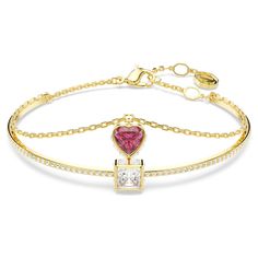 This captivating double bracelet is made with romance in mind. The gold-tone plated design features a rigid band with clear pavé and a square center stone in clear Swarovski Zirconia, while the chain is adorned with a heart-shaped center stone, which is made from red Swarovski Zirconia and enhanced with clear square crystals around the edges. Completed with a lobster closure, this bracelet is the perfect gift for someone you adore. Swarovski Jewelry Aesthetic, Fit Inspired, Double Bracelet, Understated Glamour, Random Fashion, The Bangles, Heart Red, Swarovski Bracelet, Crystal Bangle