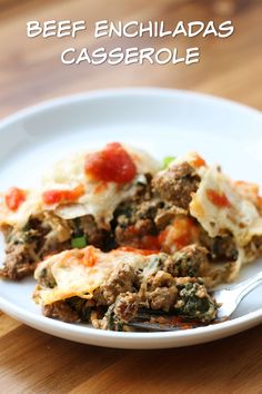 beef enchiladas casserole on a white plate