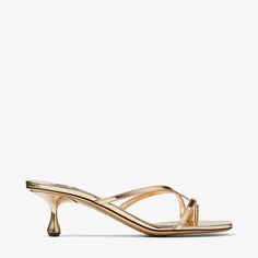 A sculptural design with a graphic drop heel, the Etana mule is modern update to a wardrobe classic. Crafted from leather with a metallic finish, this statement design features elegant crossover straps. Gold Mules, Jimmy Choo Gold, Wardrobe Classic, Sneaker Dress Shoes, Jimmy Choo Shoes, Footwear Design Women, Leather Mules, Color Dorado, Mens Fragrance