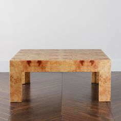 a wooden table sitting on top of a hard wood floor