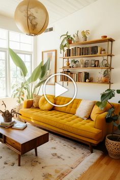 a living room filled with furniture and plants