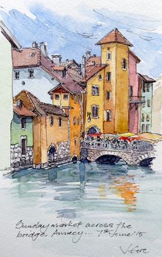 watercolor and ink drawing of buildings along the river