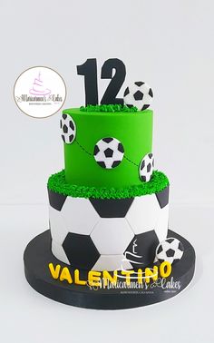 a green and black soccer themed cake with the number twelve on it's side