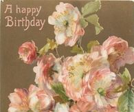 a happy birthday card with pink flowers in a vase on a brown background and the words, a happy birthday