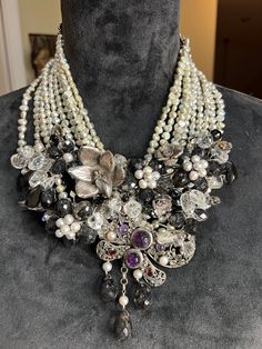 "This beauty is a one of a kind for sure !  All findings  and anything silver has been tested and is 925  sterling , all gem stones also tested and are genuine with baroque pearls adorning the bib it's suspended from   This is a collectors dream showing detail to every inch. The gemstones are amethyst and tourmaline in the butterfly and most all of the clear gems around the entire bib are registering as amethyst although clear.  The crystals are amazing !! This is truly a fabulous piece of artwork hallmark tag says \"jessie\"  In my research i did not find another like it any place.     Shipping with insurance will be provided." Silver Multi-strand Jewelry With Pearl Pendant, Party Jewelry With Pearl Pendant And Crystal, Silver Crystal Pearl Necklace Gift, Silver Crystal Pearl Necklace As A Gift, Silver Crystal Pearl Necklace For Gift, Exquisite Sterling Silver Bridal Necklace For Party, Elegant Handmade Bib Necklaces For Wedding, Elegant Handmade Bib Necklace For Wedding, Sterling Silver Beaded Multi-strand Jewelry