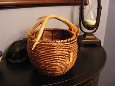 a wicker basket sitting on top of a table