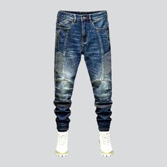 The 2024 Autumn-Winter Collection brings you the ultimate blend of vintage style and modern functionality with these mid-waist smoothed motorcycle jeans. Featuring slim fit silhouettes, medium wash, sanded, whiskered, biker, side-zippers, zipper & button closure, and stretchy fabric, these jeans are the perfect way to make a statement. Dare to be different and make heads turn with this distinctive biker style! Vintage Style: A traditional biker style for those who crave the vintage look. Medium Mid-rise Denim Jeans For Winter, Fitted Mid-rise Winter Jeans, Winter Dark Wash Mid-rise Jeans, Winter Mid-rise Denim Jeans, Fitted Denim Blue Washed Cargo Jeans, Winter Streetwear Jeans, Fitted Rigid Denim Cargo Jeans With Five Pockets, Fitted Cargo Jeans With Five Pockets, Fitted Medium Wash Jeans With Zip Fly