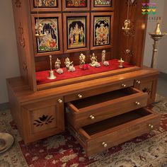 a wooden cabinet with drawers and pictures on the wall